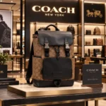 Coatch Signature Canvas Charter Backpack with Black Leather Flap, Dual Buckle Closures & Front Zip Pocket (058)