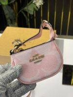 Coatch teri combo with small pouch and charm with og box(1102-pink) - Image 4