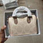 Coac mini Rowan satchel bag in blocked signature with box 874
