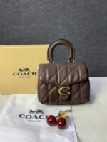 Coac tabby top handle quilted leather with cherry charm with box 882 - Image 2