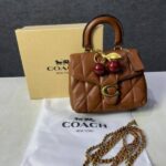 Coac tabby top handle quilted leather with cherry charm with box 881