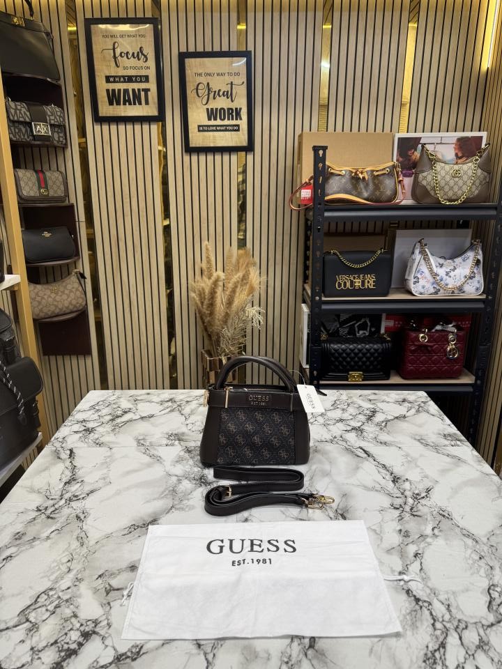 6ace0c5d8b2500.jpeg GUESS Coffee Signature Mini Satchel Bag With Dust Bag - Image 1