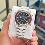 OMEGG_A Seamaster Planet Ocean 600M Co-Axial Chronograph 007 silver Black orange. - Image 2