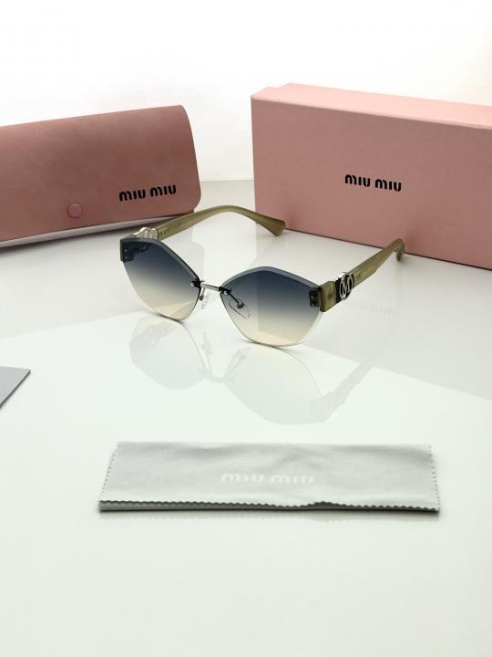 6ace22dc53e700.jpeg Miu miu 58121 sea green - Image 1