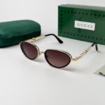 Guchi gold brown