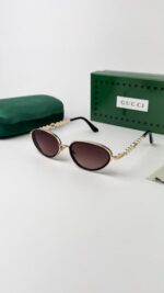 Guchi gold brown