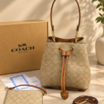 Coacch Rowan Signature Khakhi Brown Bucket Bag With Small Removable Zip Pouch With OG Box & Dust cover Khakhi Brown
