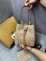 Coacch Rowan Signature Brown Bucket Bag With Small Removable Zip Pouch With OG Box & Dust cover Presbyopia Brown - Image 3