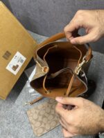 Coacch Rowan Signature Brown Bucket Bag With Small Removable Zip Pouch With OG Box & Dust cover Presbyopia Brown - Image 2
