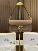 Coac tabby shoulder sling bag with og box 552 fix