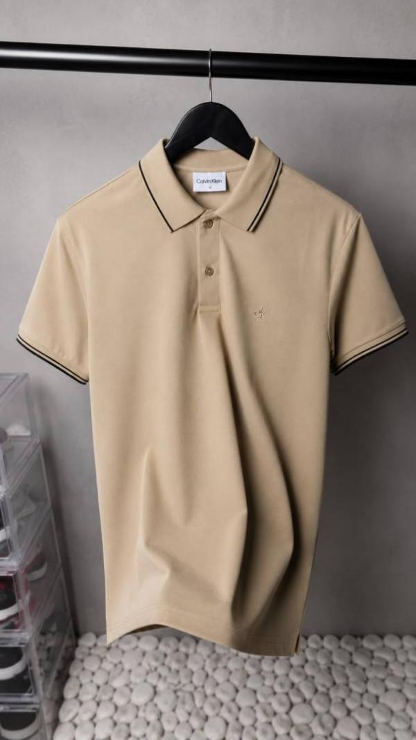 6ad00ae7ef8070.jpeg Calviin Kleiin Premium Polo T-Shirt 1949 - Image 1